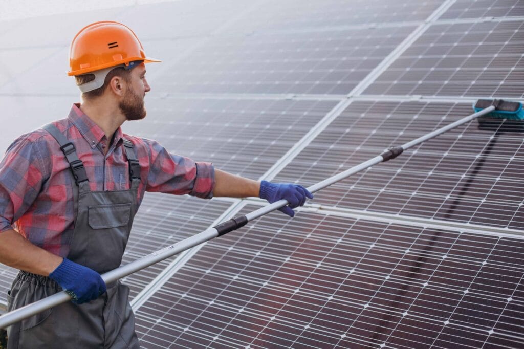 Solar Panel Maintenance and Performance Optimization for Commercial Energy Systems 1 cleaning solar panels